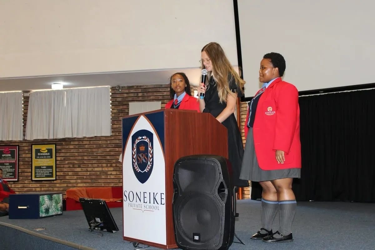 Proud Grade 8 learners in their new blazers at Soneike