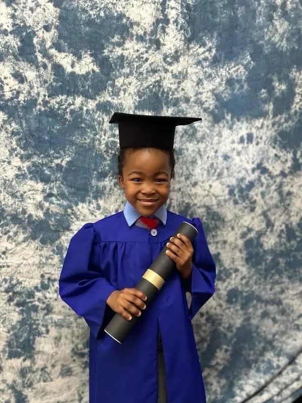 Soneike Grade R learner in graduation gown and cap at the annual Graduation Ceremony