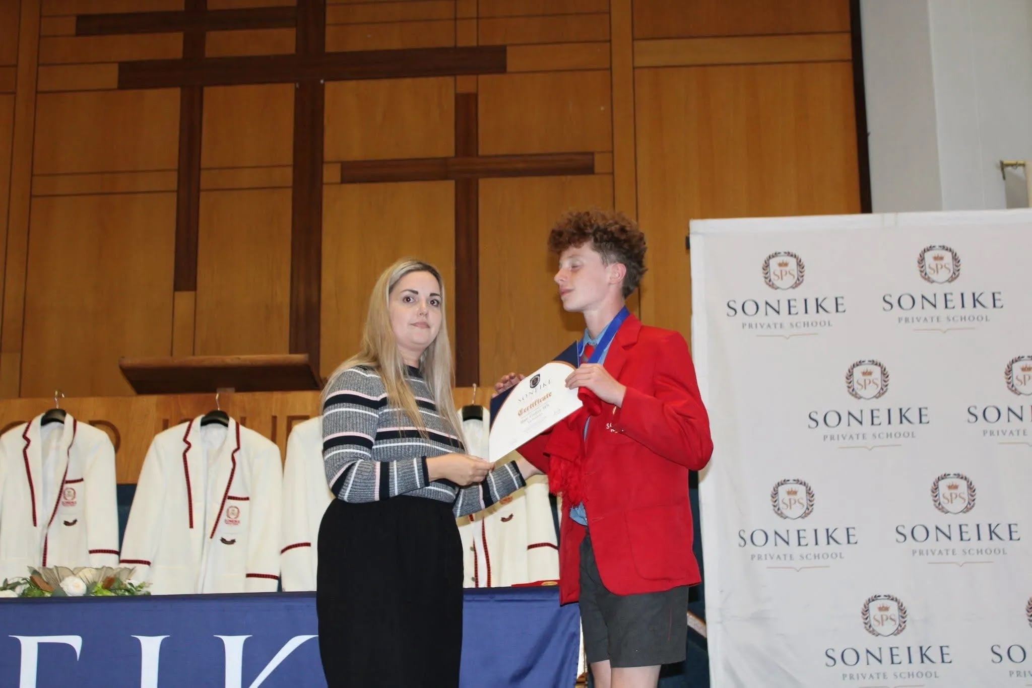 Soneike Trailblazers Term 1 awards — learner receiving award on stage